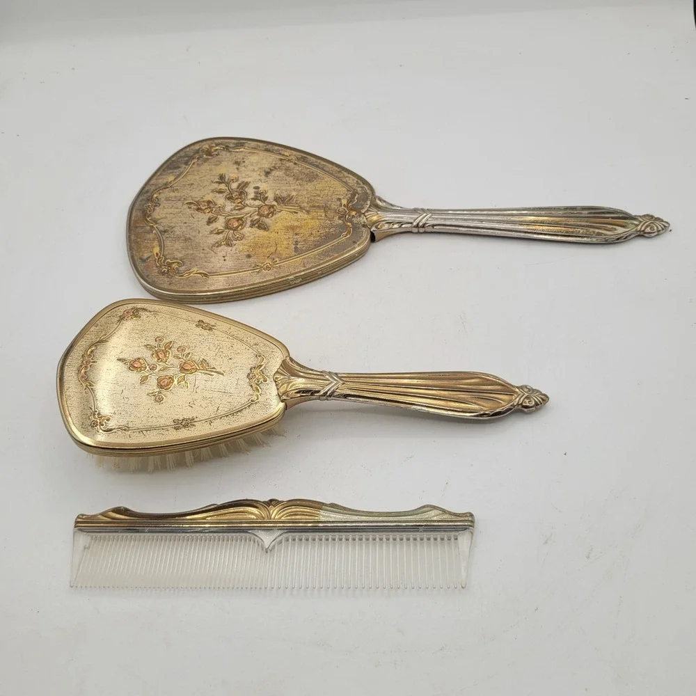 Vtg Vanity Set Hand Mirror, Hair Brush and Comb‎ Gold color trim and handle.
